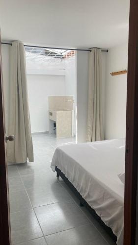 Katil atau katil-katil dalam bilik di Casa linda San Carlos