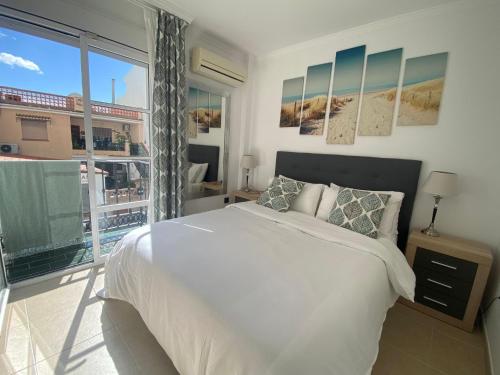 Voodi või voodid majutusasutuse Beach Apartment La Cala de Mijas toas