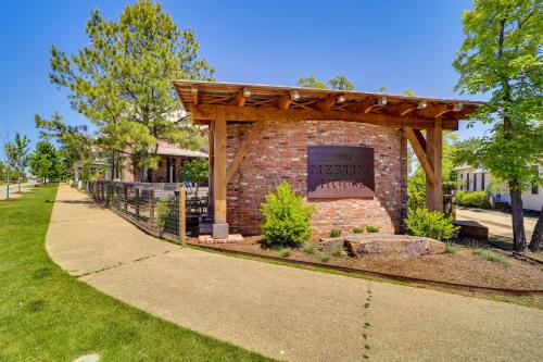 a pavilion with a sign on it in a park at Carlton Landing Home at Lake Eufaula! in Eufaula