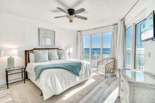 a bedroom with a bed with a view of the ocean at Hp 24w Condo in Rosemary Beach