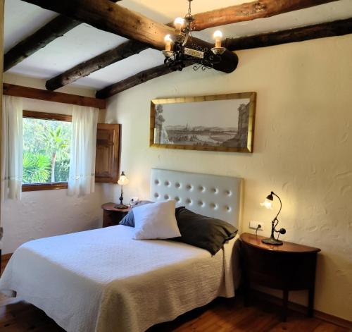 Postel nebo postele na pokoji v ubytování Hotel Restaurante Las Buitreras