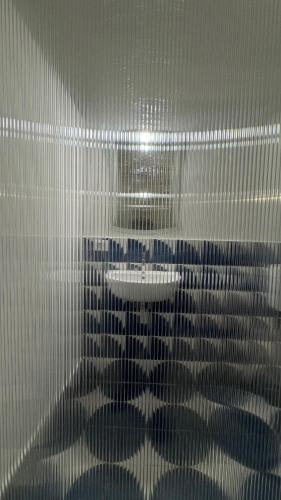 a reflection of a table in a room at CAPRI DESIGN ROOM in Capri