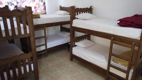 a group of bunk beds in a room at Salerno Dormitory in Dahab