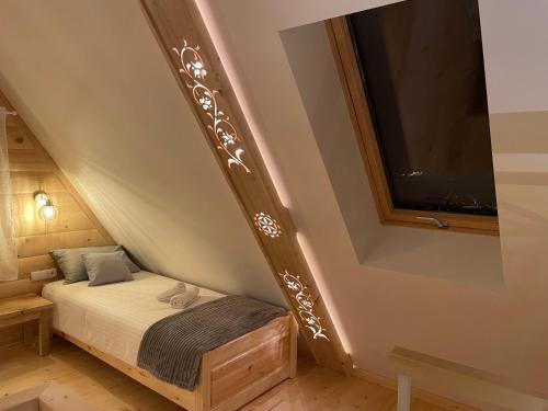 Voodi või voodid majutusasutuse Widok Apartamenty Zakopane toas