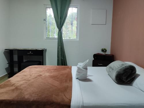 Postel nebo postele na pokoji v ubytování Apartamento sarita centro