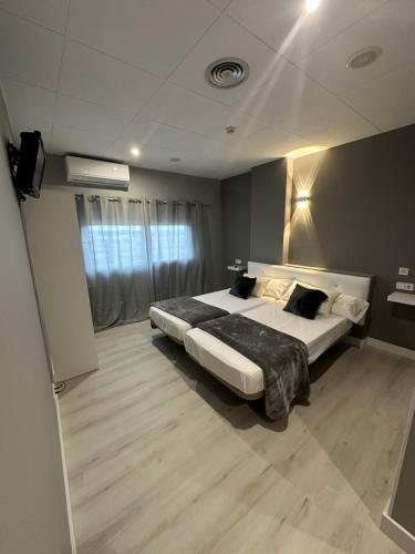 Ένα ή περισσότερα κρεβάτια σε δωμάτιο στο Hotel Vanity