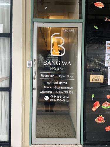 a sign on the door of a bakery at Bangwa House - MRT Bangwa Station in Bangkok