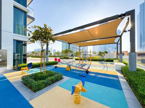 a playground with a slide in a building at First Class Stay in Downtown Dubai Near Burj Park by SBH in Dubai