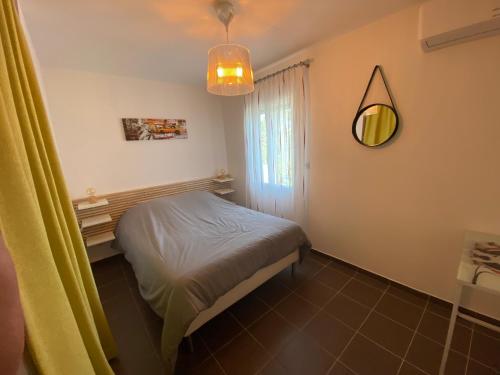 Llit o llits en una habitació de Villa Vanessa