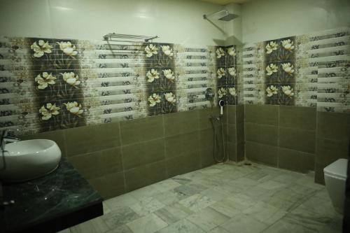 Vonios kambarys apgyvendinimo įstaigoje HOTEL NAHAR