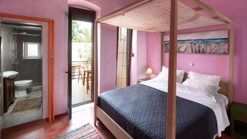 Voodi või voodid majutusasutuse Labyrinthos Arts Guest House toas