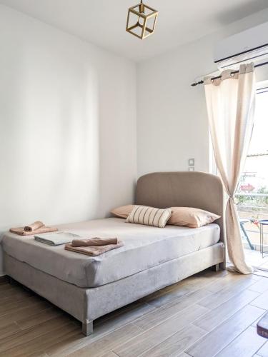 Un pat sau paturi într-o cameră la Cozy Apartment