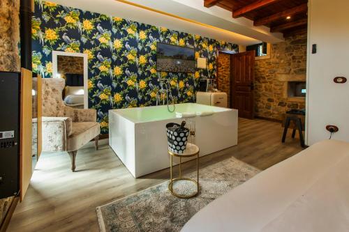 Μια τηλεόραση ή/και κέντρο ψυχαγωγίας στο Casa de Lema Boutique