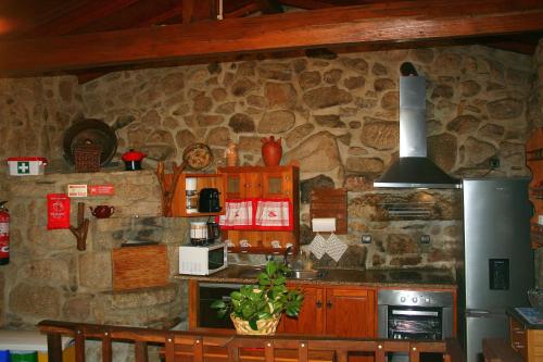 Cuina o zona de cuina de Casa Da Rocha