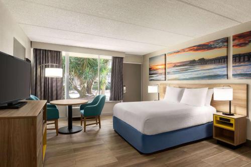 Days Inn by Wyndham Cocoa Beach Port Canaveral Image