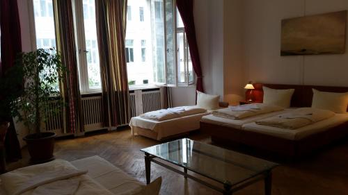 Ένα ή περισσότερα κρεβάτια σε δωμάτιο στο Hotel Pension Kima