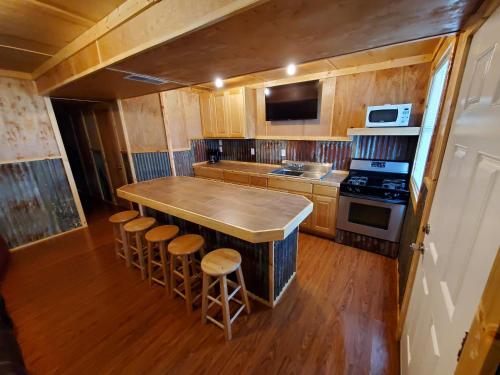 a kitchen with a large island in a tiny house at Baffin Bay Penthouse in Corpus Christi