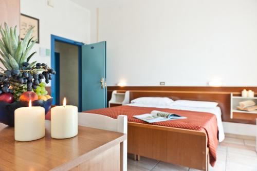 Tempat tidur dalam kamar di Hotel Antony