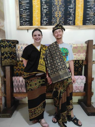 a man and a woman posing for a picture at Tastura Homestay in Praya