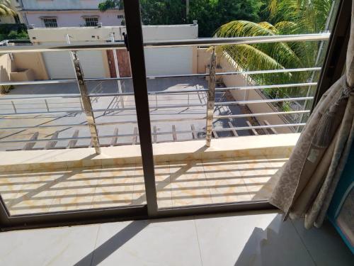 a view from a window of a balcony at Villa 1428 in Grand Baie