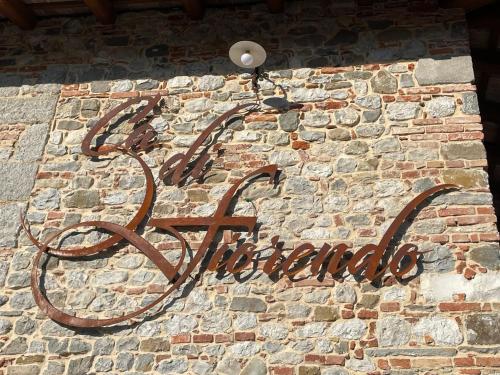 Un certificado, premio, letrero u otro documento en Ca' di Fiorendo