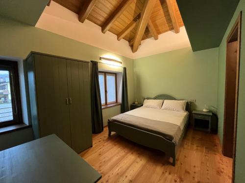 Una cama o camas en una habitación de Ca' di Fiorendo