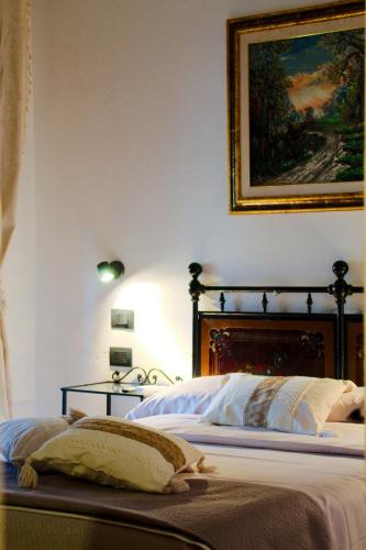 Cama o camas de una habitación en Domuseo