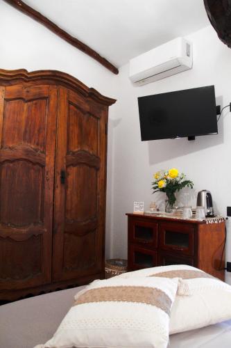 Cama o camas de una habitación en Domuseo