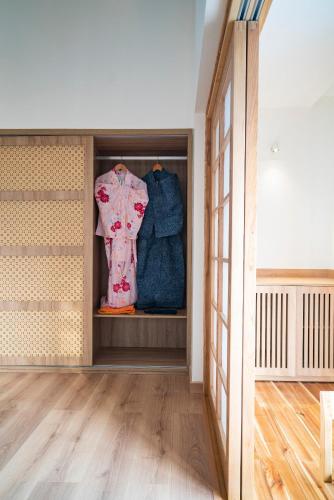 a walk in closet with at Hajime Homestay Hue in Hue
