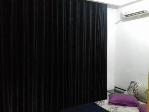 Appartement meublé centre ville de Tunis tesisinde bir odada yatak veya yataklar