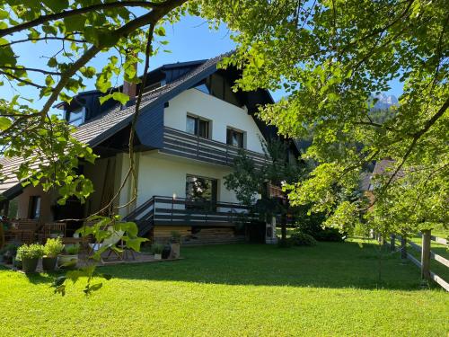a view of the house from the yard at Apartment Židana marela - Attic with a View in Kranjska Gora