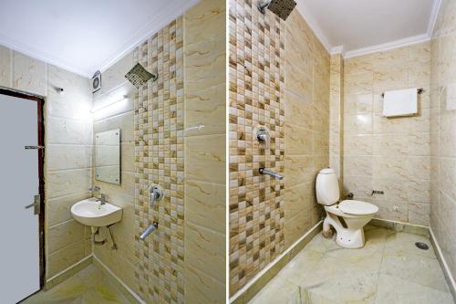een badkamer met een toilet en een wastafel bij Hotel Repose Comfert Near New Delhi Railway Station in New Delhi