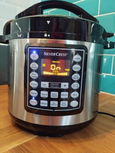 a slow cooker with the screen on it on a counter at Le Breil Furet in Ménéac