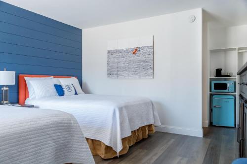 Postel nebo postele na pokoji v ubytování Flagship Inn