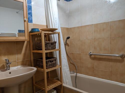 a bathroom with a sink and a toilet and a shower at La maison de Daniel - Esparron-de-Verdon in Esparron-de-Verdon