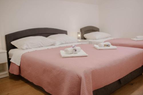 เตียงในห้องที่ Apartment Martin-nearby Krka National park