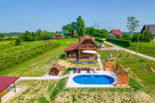 an aerial view of a house with a swimming pool at Hižica Bubika in Karlovac