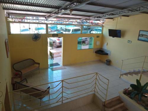 an overhead view of a living room with a balcony at BELAS PRAIAS POUSADA in Alter do Chao