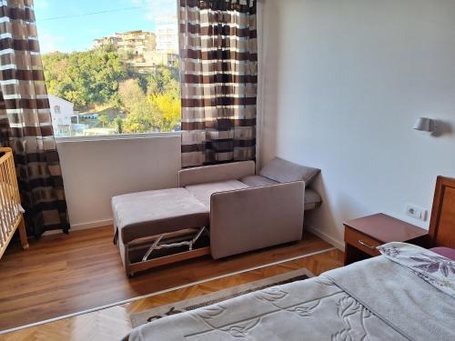 Ένα ή περισσότερα κρεβάτια σε δωμάτιο στο Rudovic Apartments