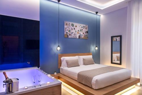 a bedroom with a bed and a bath tub at MAIN - Duomo in Naples