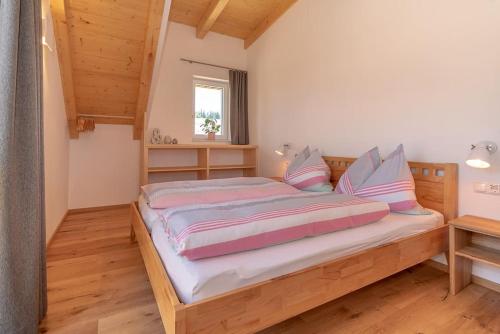 מיטה או מיטות בחדר ב-Appartement Tannenhof IV