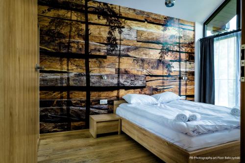 Ένα ή περισσότερα κρεβάτια σε δωμάτιο στο Apartament 114 Szklarska Poręba