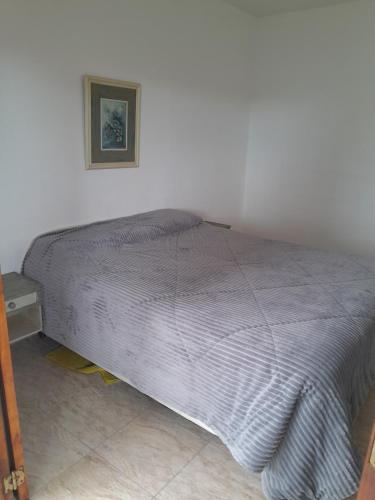 Ein Bett oder Betten in einem Zimmer der Unterkunft Los Gallegos