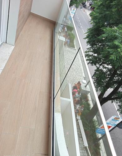 an external view of a glass facade of a building at Residenza delle Nazioni in Gatteo a Mare