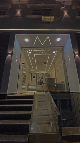 - une vue sur un escalier dans un bâtiment dans l'établissement MASA HOTEL, à Mît Khamîs