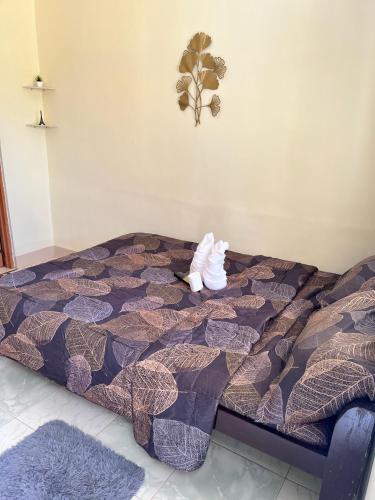 Postel nebo postele na pokoji v ubytování Trisha Guesthouse