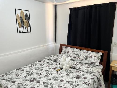 Postel nebo postele na pokoji v ubytování Trisha Guesthouse
