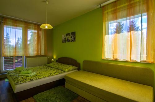 Postel nebo postele na pokoji v ubytování Apartman 25 Vysoké Tatry