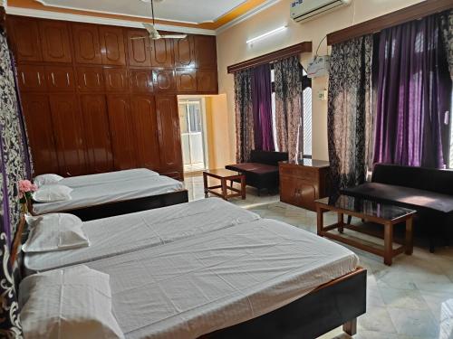 Postel nebo postele na pokoji v ubytování Shantiniketan 2 BHK Homestay in Ayodhya