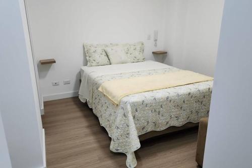 En eller flere senge i et værelse på Lady Lodge - San Isidro